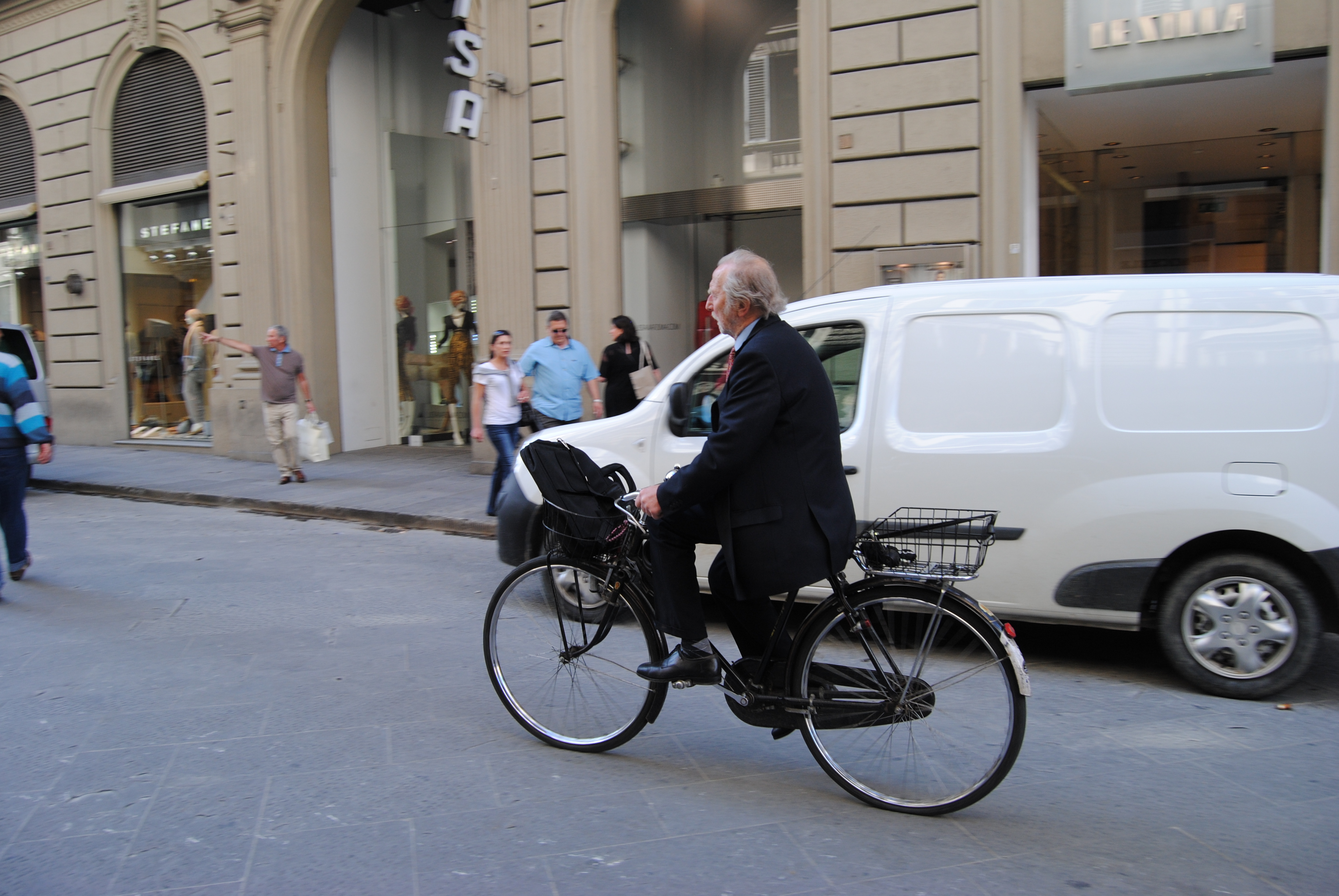 Man on bike in Florence Italy